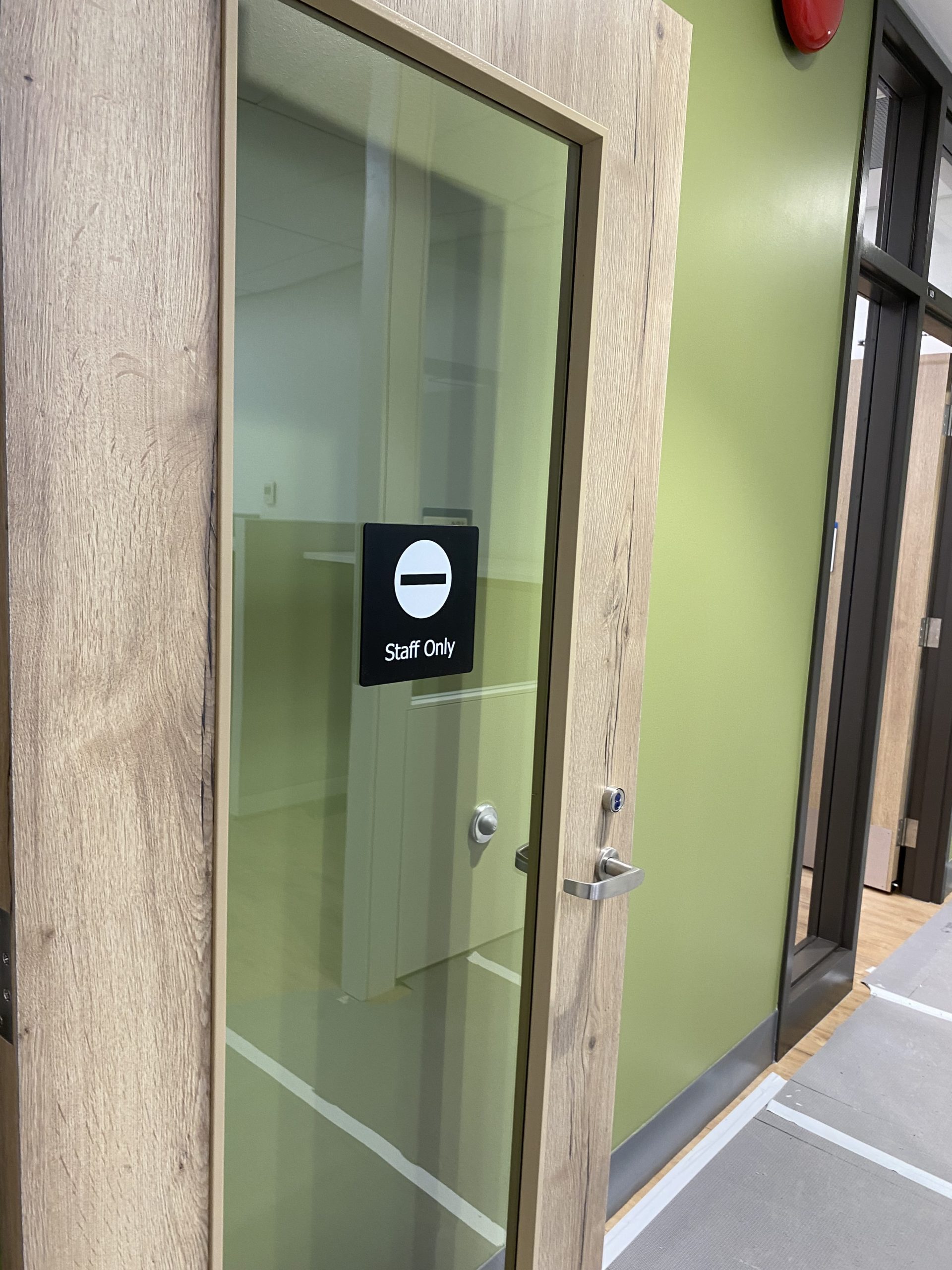 The Impact of Interior Door Signs on Workspace Dynamics